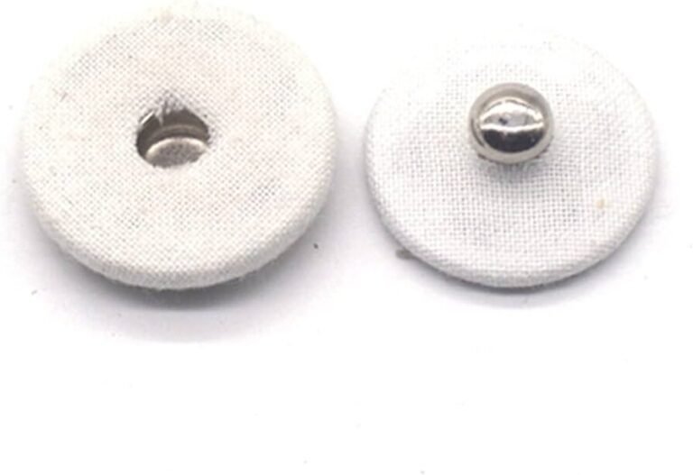 boutons pression appliques sur tissu epais