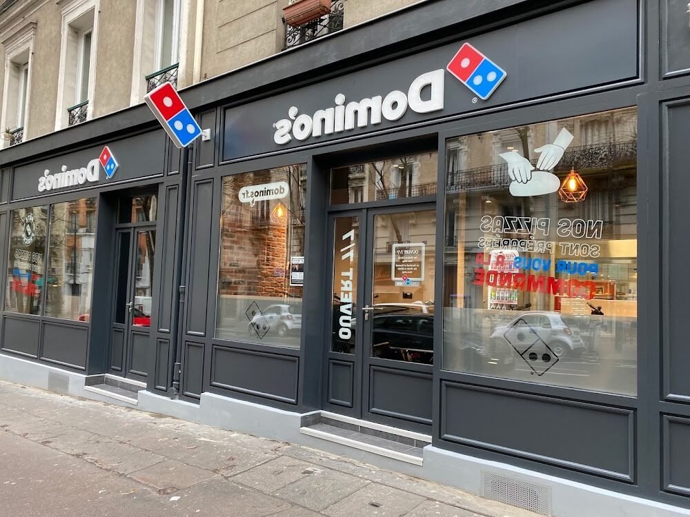 Où se trouve la pizzeria Domino’s sur la rue de Falaise